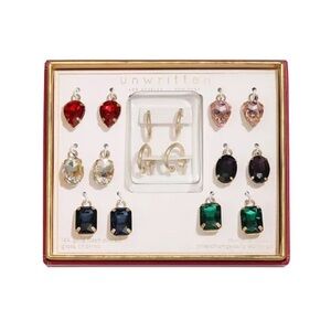 Two boxes of Unwritten Interchangable Boxed Earrings Set